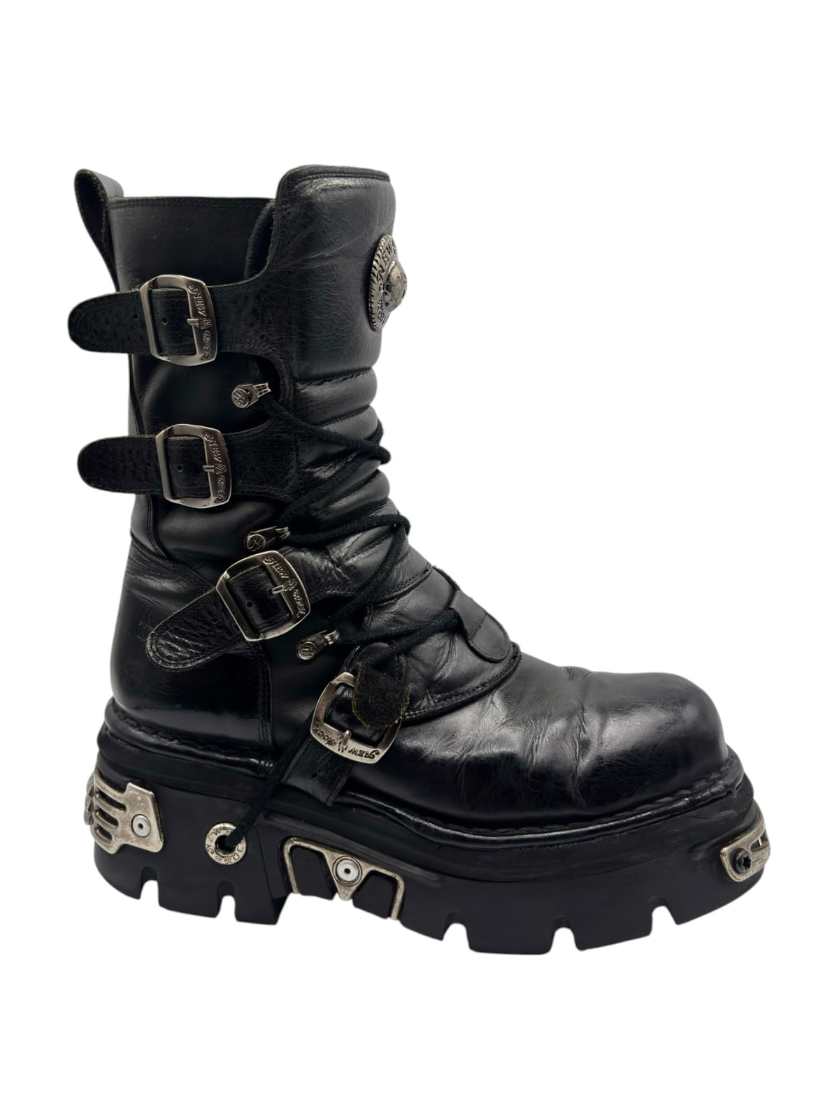 Black mid-calf reactor boots with straps across the laces and thick outsole