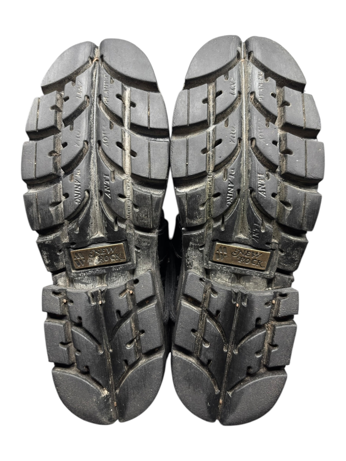 Pair of New Rock mid-calf boots showing rugged rubber outsole tread