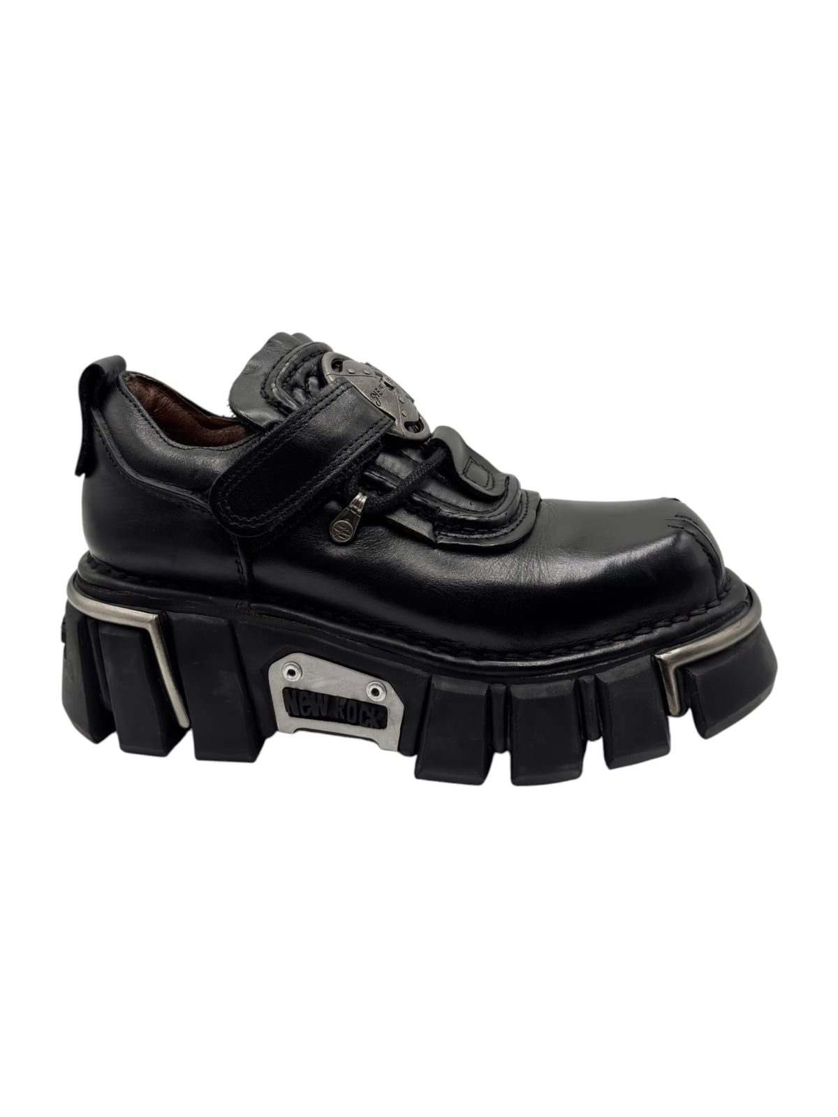 Black New Rock platform boots with adjustable strap and metal badge on side