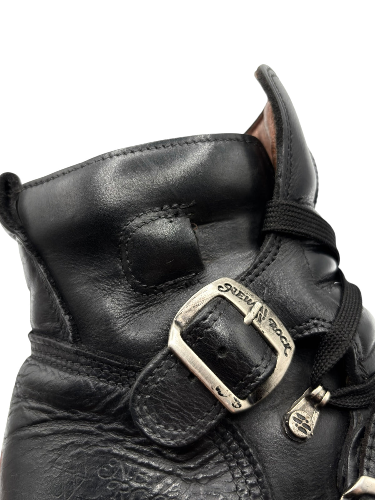 Black vintage raised-heel leather boot upper with metal buckle detail