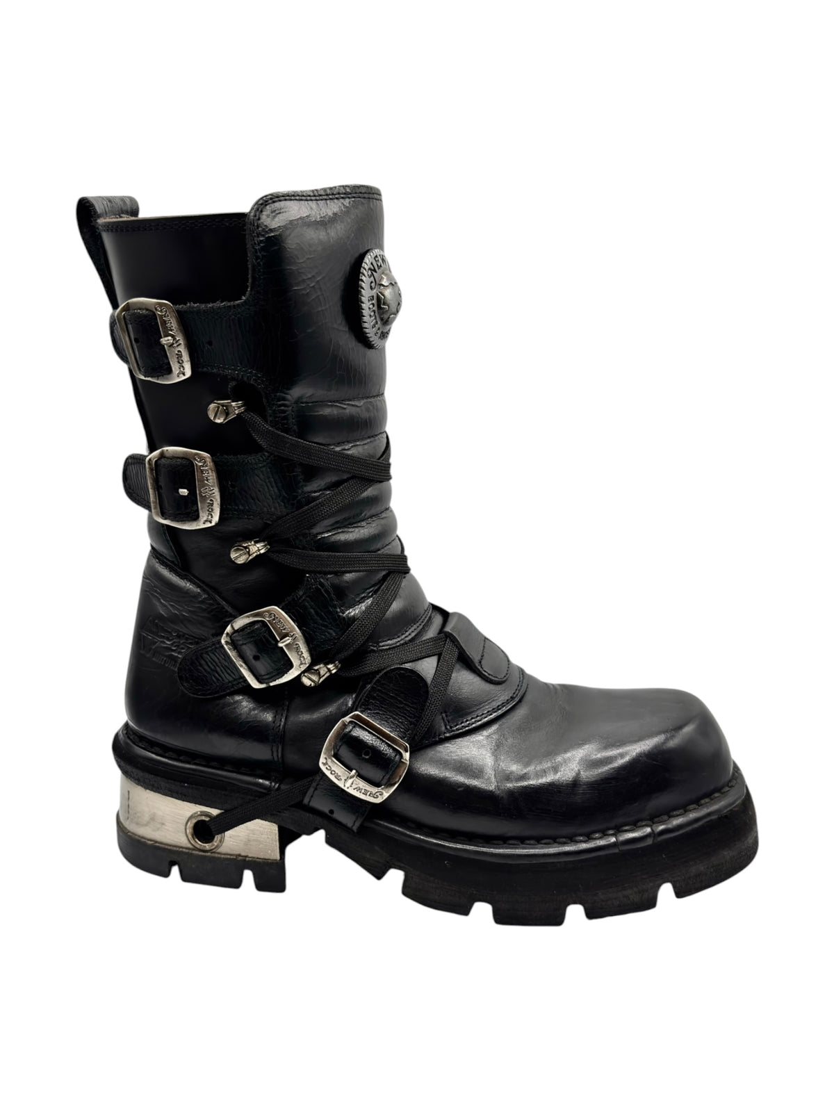 Black lace-up platform boots with multiple buckle straps and thick tread sole