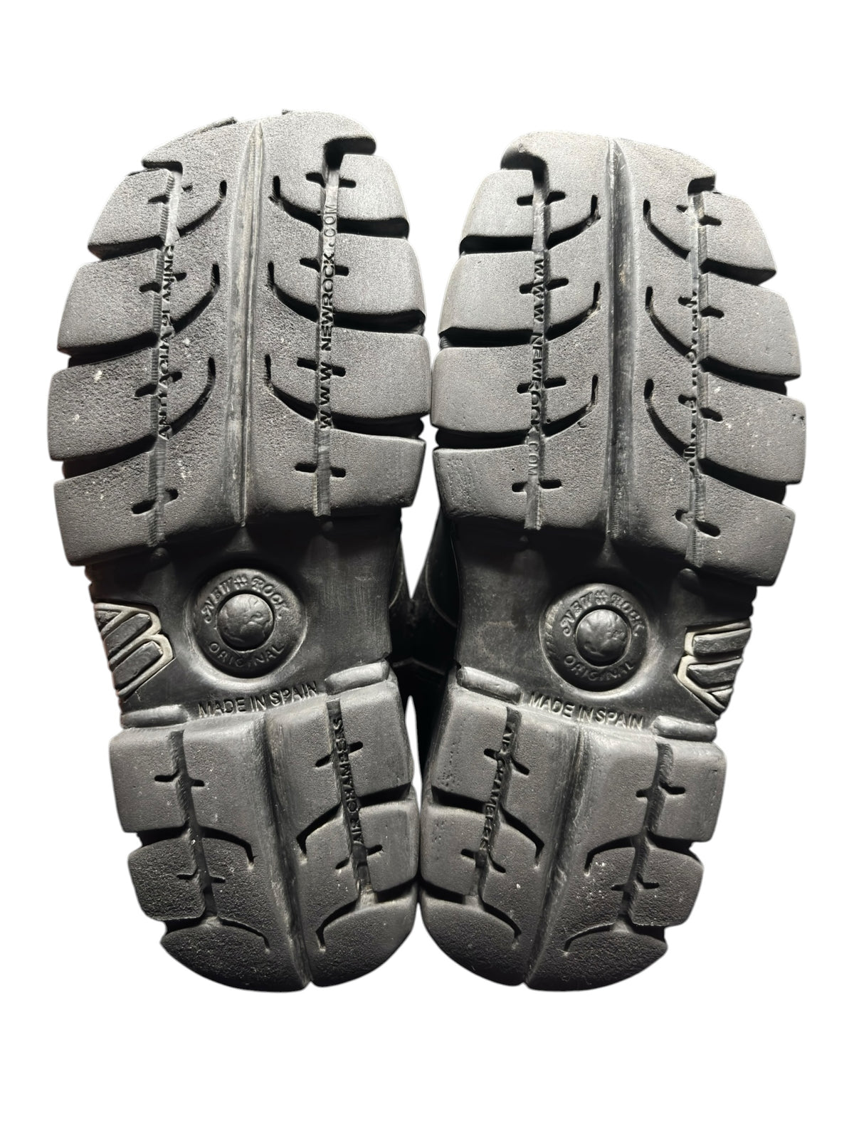 New Rock Mili lace-up platform boots with gray rubber soles and tread pattern, pair view
