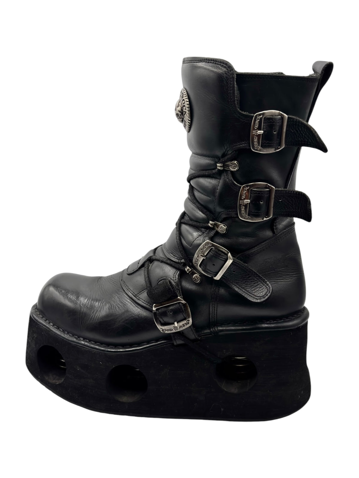 Black mid-calf platform boots with multiple metal buckles and strap details
