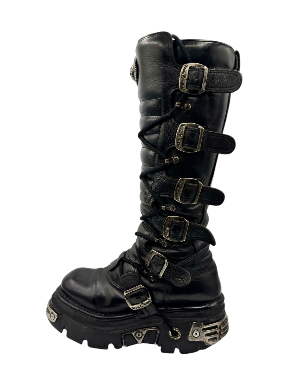 Black knee-high boots with three front straps, metal buckles, and chunky platform sole