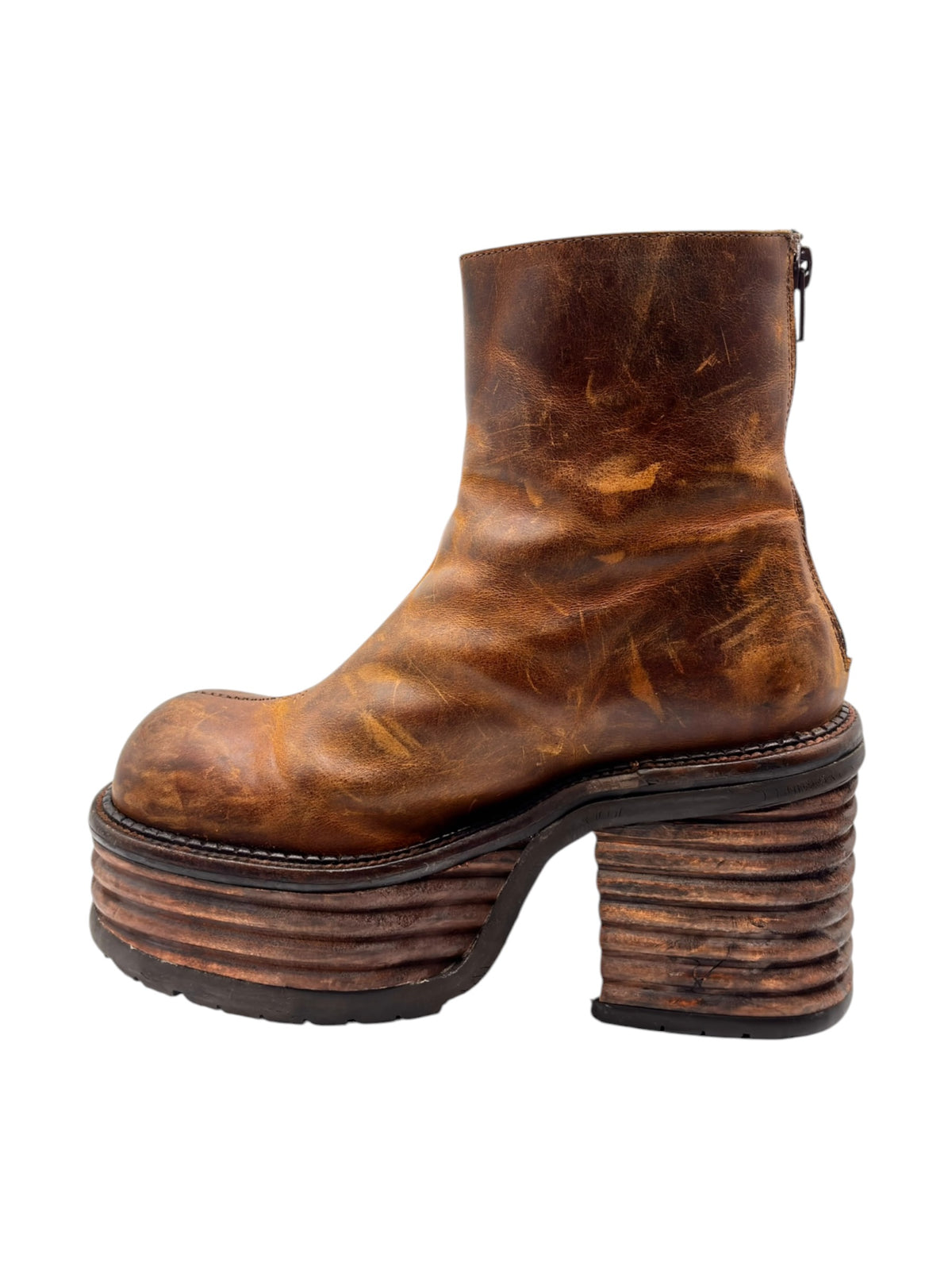 Brown leather ankle boots with side zipper and ridged stacked block heel