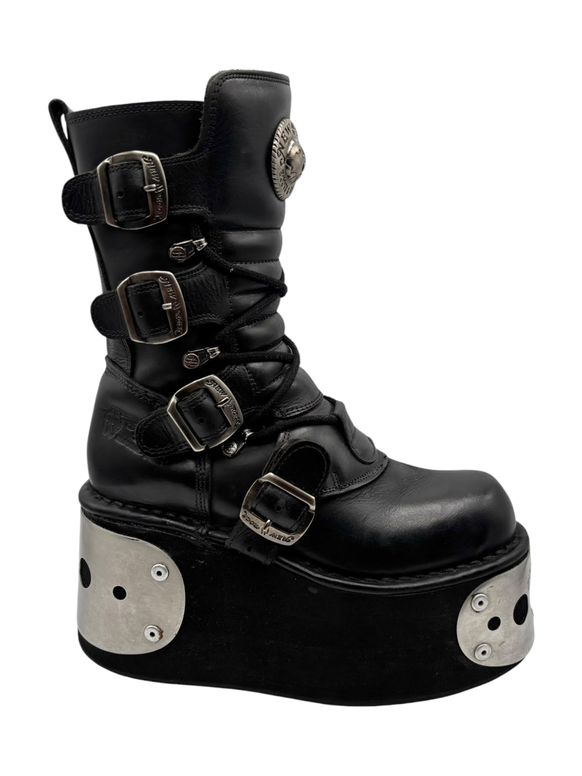 Black platform boots with multiple buckles and silver metal sole plates