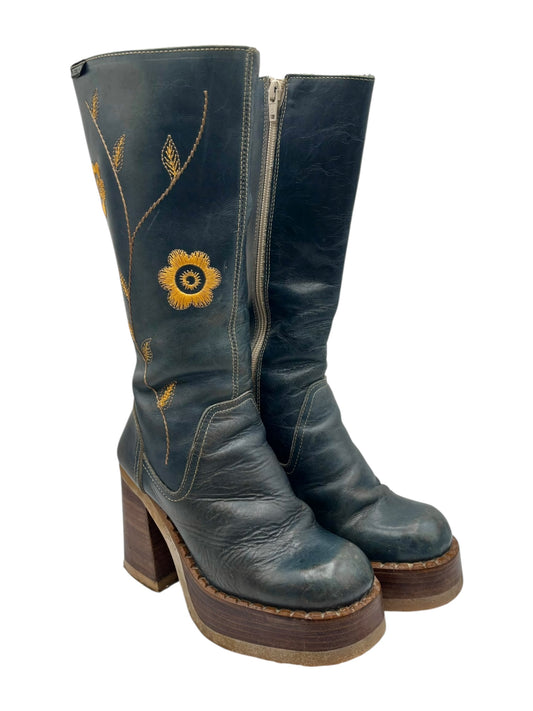 Dark blue knee-high platform boots with sunburst flower embroidery and block heel