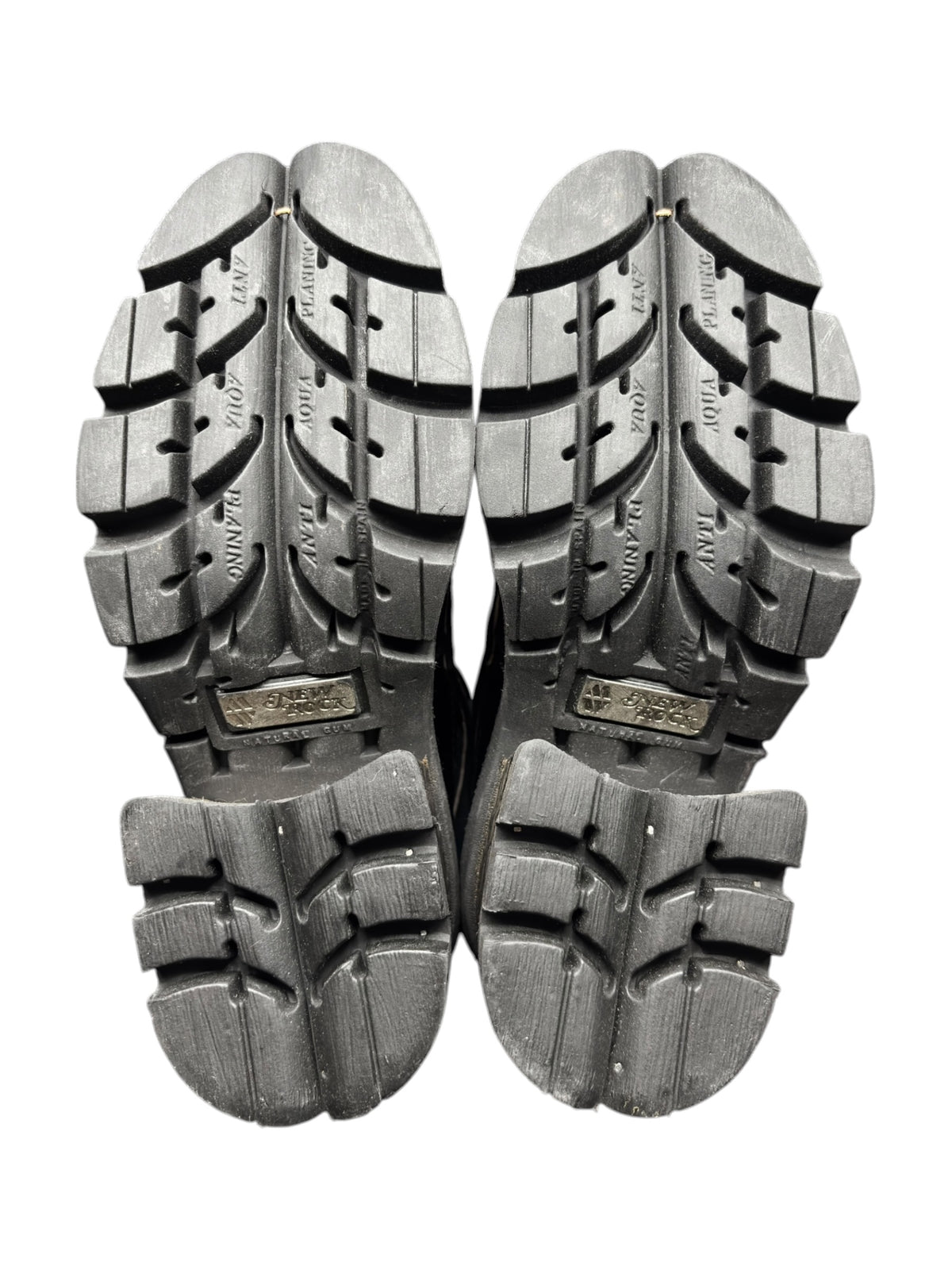 Pair of platform heel soles with chunky tread patterns and side edge grips.