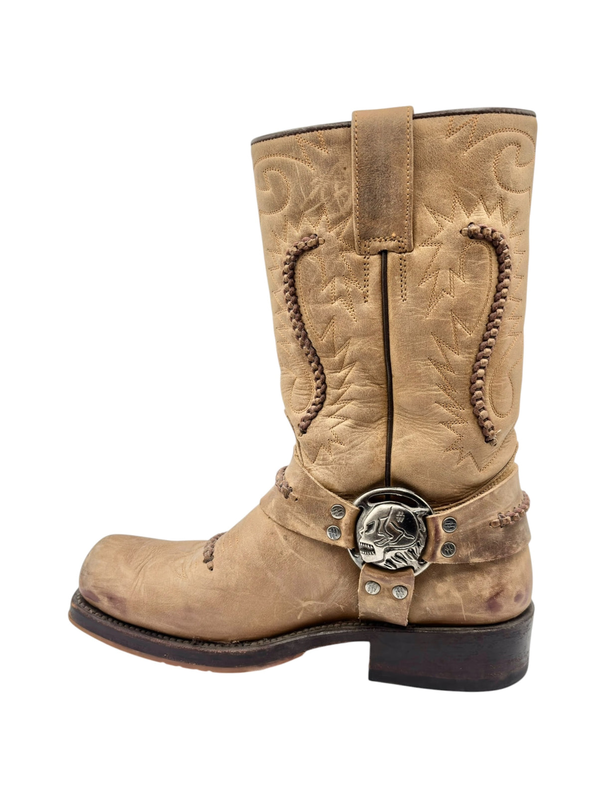 Beige cowboy boot with ornamental strap across shaft and western stitching