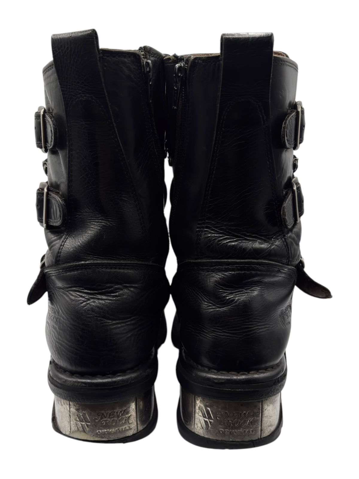 Pair of black leather mid-calf boots with buckled straps and stitched pull tabs