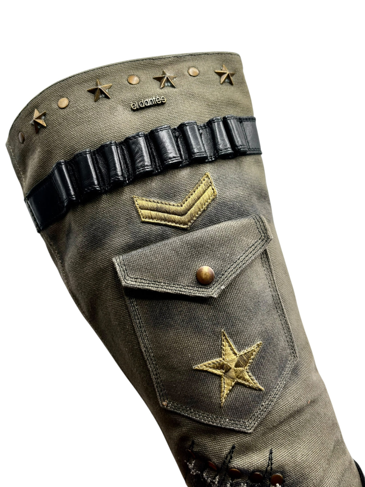 Knee-high olive boots with eldanis nameplate, gold star patches, and black belt strap