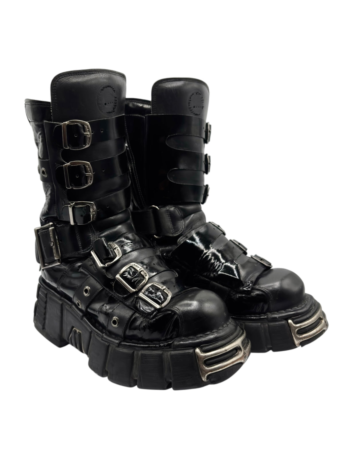 Black leather boots with triple side buckles and thick platform sole