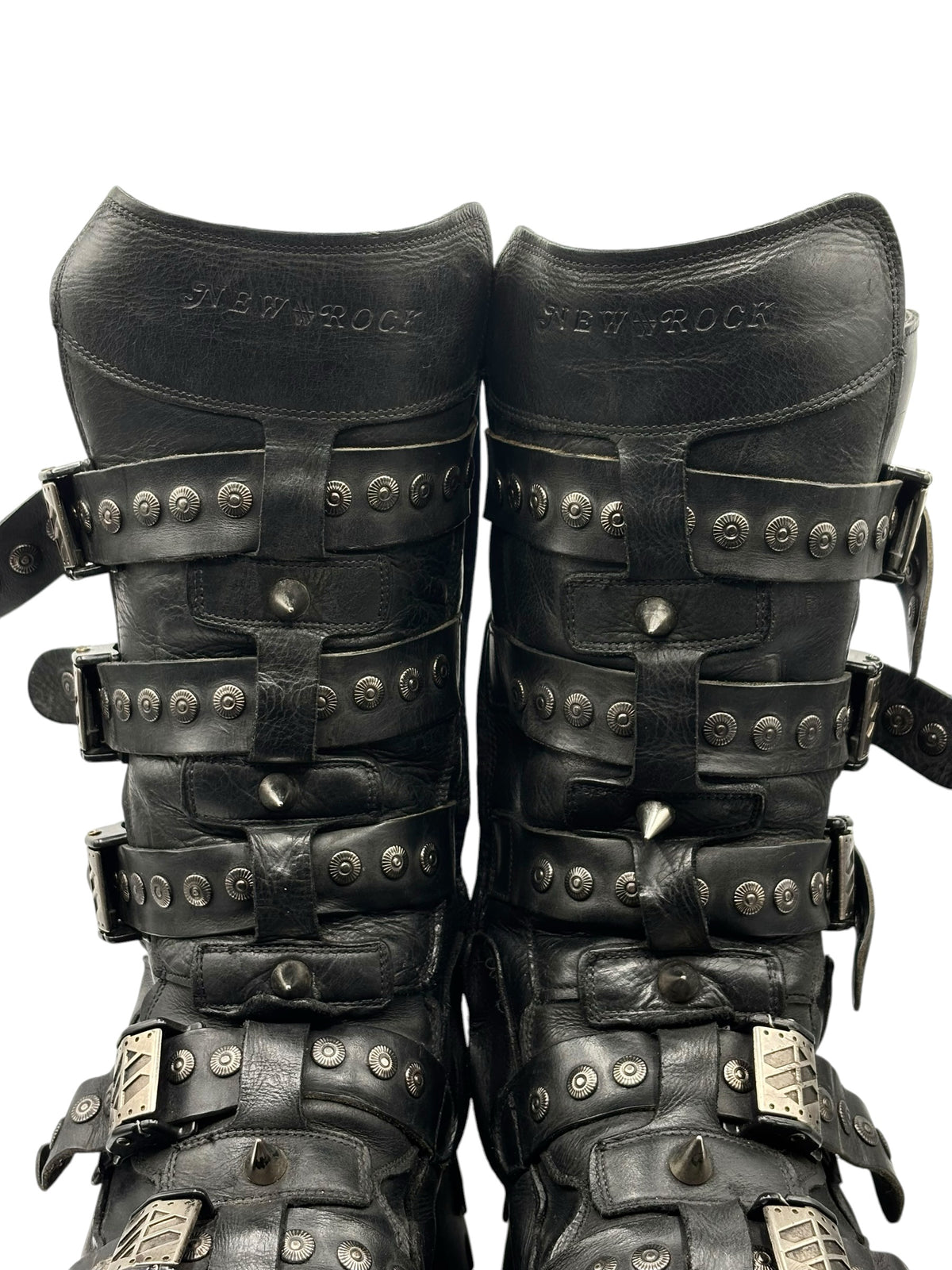 Black studded leather platform boots with multiple buckled strap panels