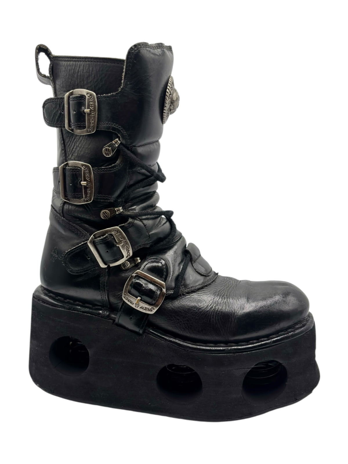 Black mid-calf platform boot with multiple buckle straps and lace-up