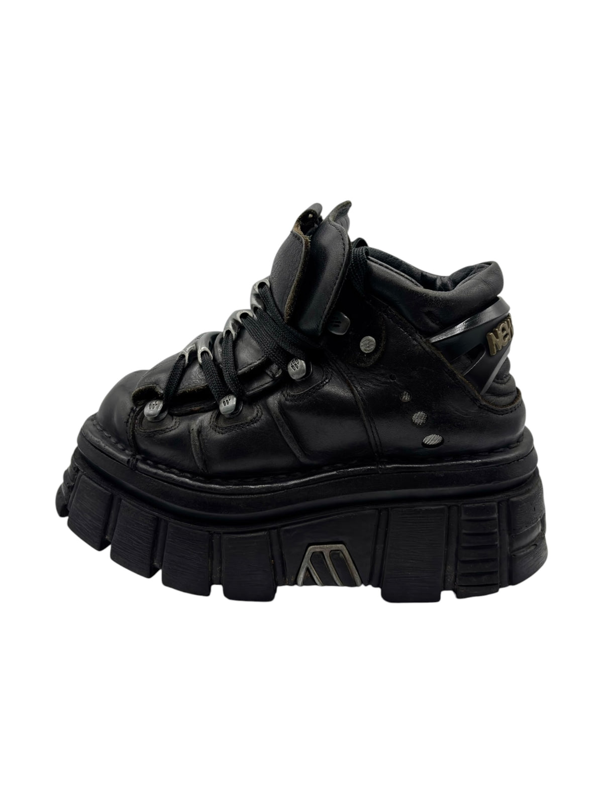 Black lace-up platform boots with chunky sole and side straps