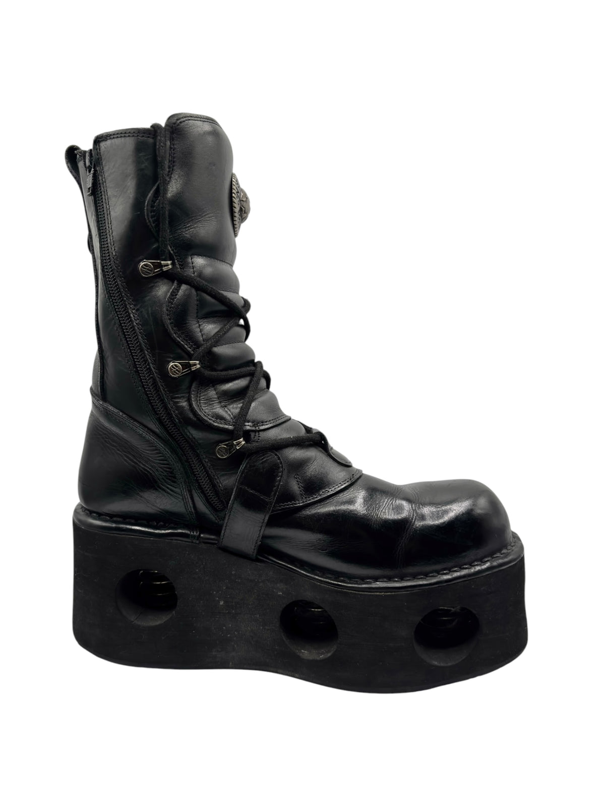Vintage black platform boots with lace-up front and two buckle straps