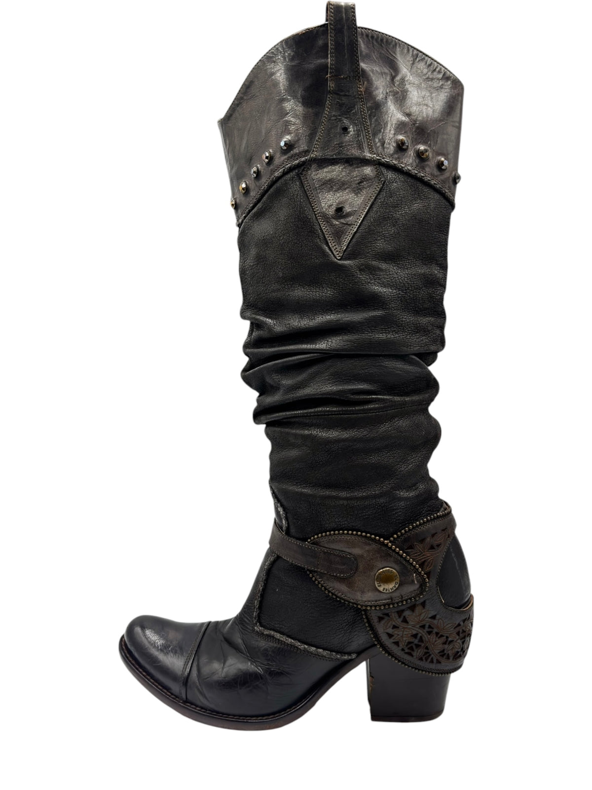 Vintage knee-high leather boots in dark finish with ruched shaft and decorative side emblem