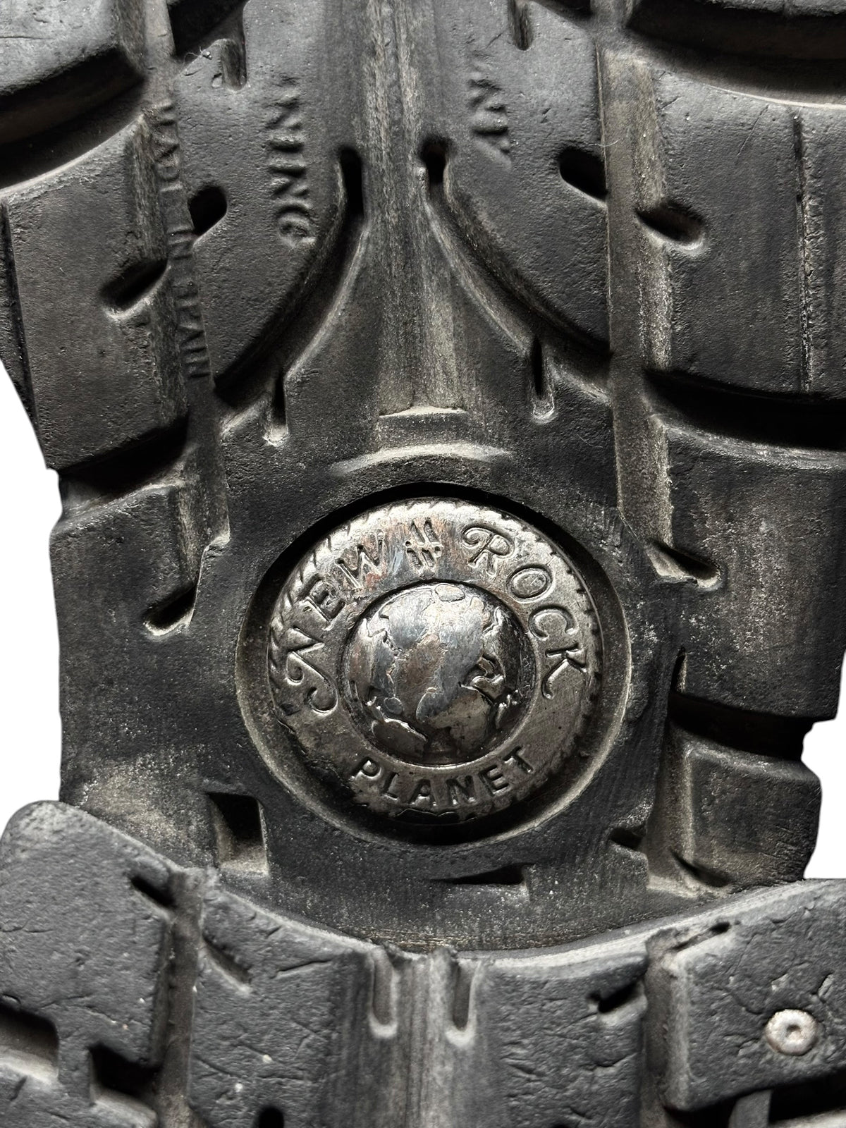 Vintage raised-heel leather boots outsole tread close-up