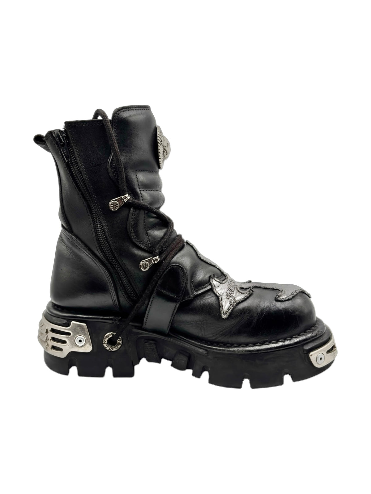 Black lace-up combat boots with side zip, buckles, and silver decorative plates