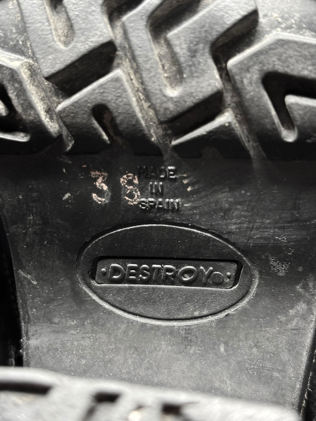 Black sole and heel with DESTROY logo, made stamp, and tread details