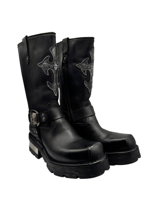 Black leather biker boots with side buckle strap and rugged tread sole