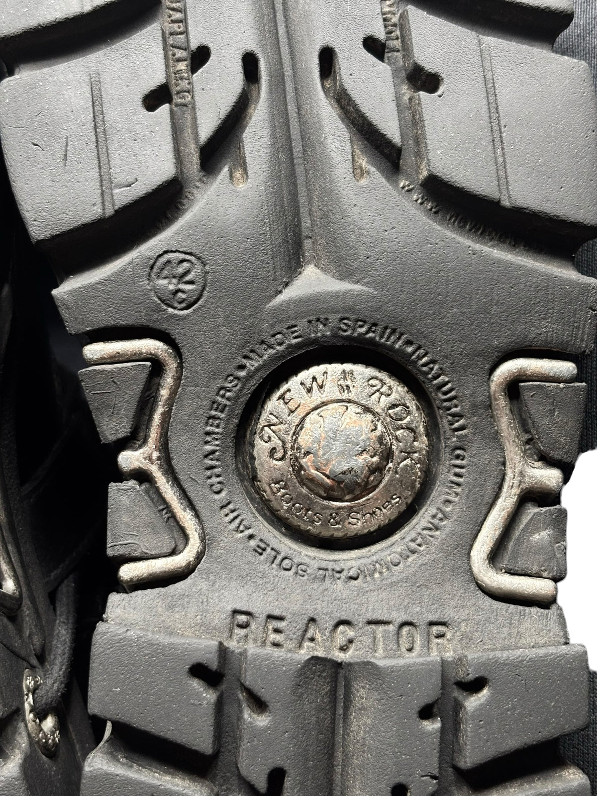 Reactor boot outsole close-up with “REACTOR” text and “MADE IN SPAIN” stamp