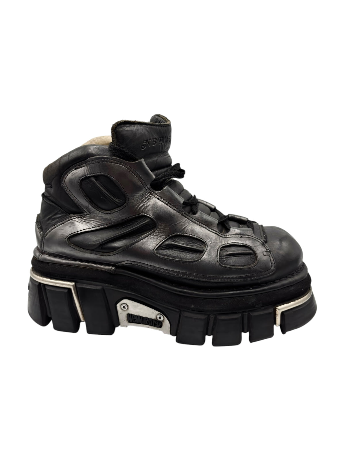 Black leather lace-up platform boots with large toe straps and lug sole