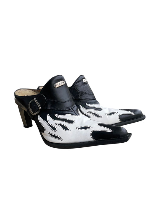 Pointy-toe heeled clogs in white and black flame print, with side buckle strap