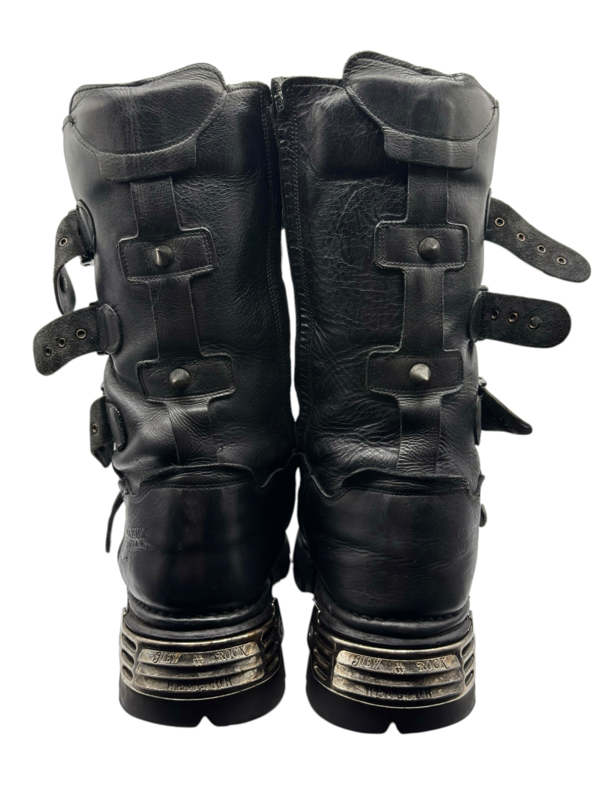 Studded black leather platform boots, back view with layered metal heel bands