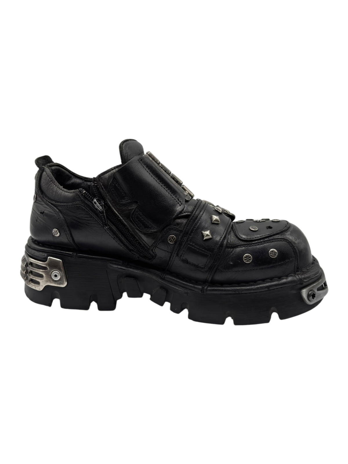 Black New Rock platform boots with buckles, metal trims, and studded straps