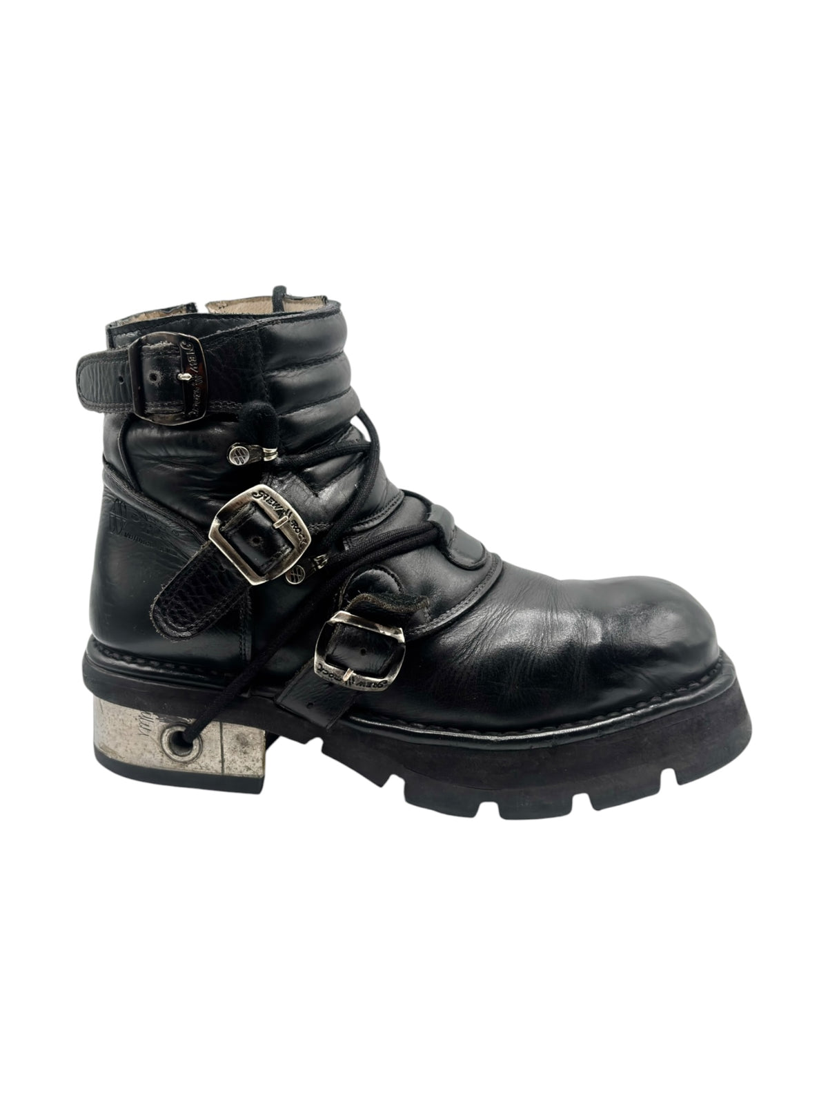 Black raised heel ankle boot angled view with two buckles and lace-up straps