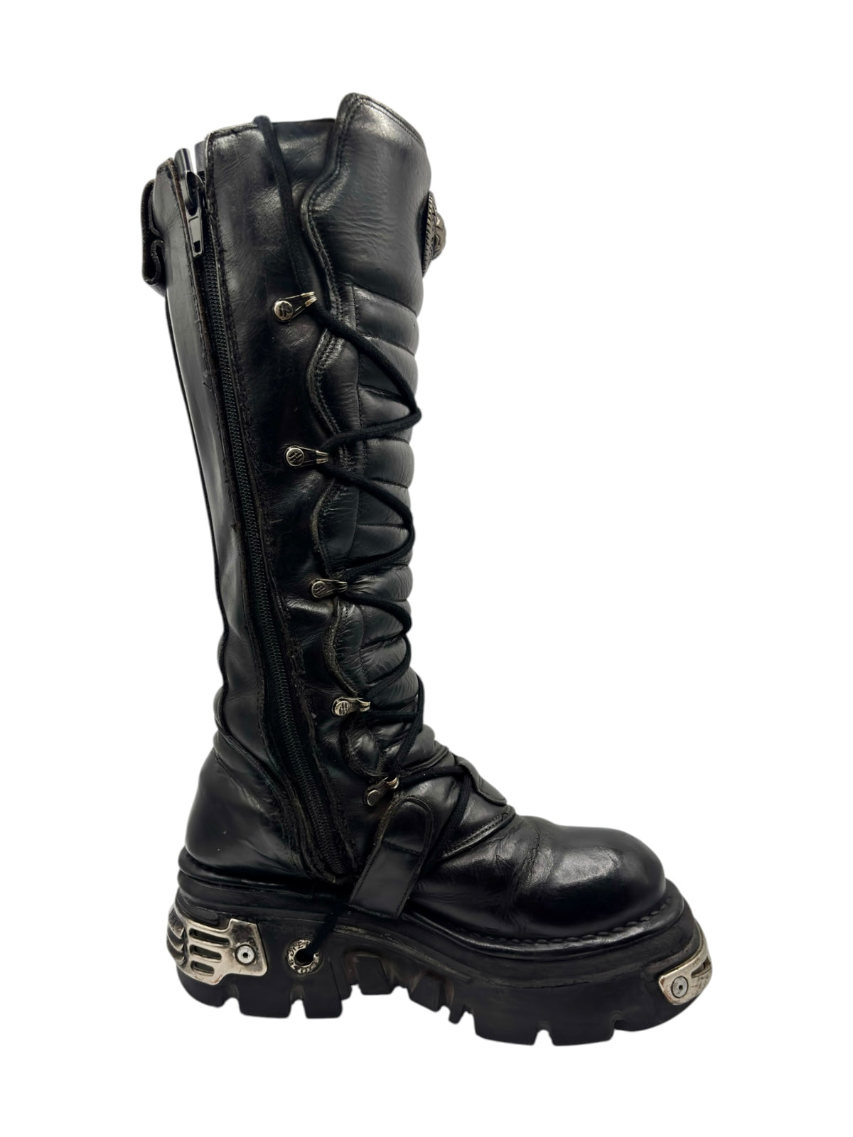 Black knee-high leather boots with lace-up front and metal strap accents on side