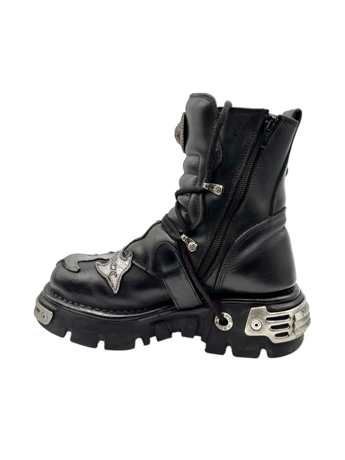 Black mid-calf boots with two side zippers and silver-tone plate details