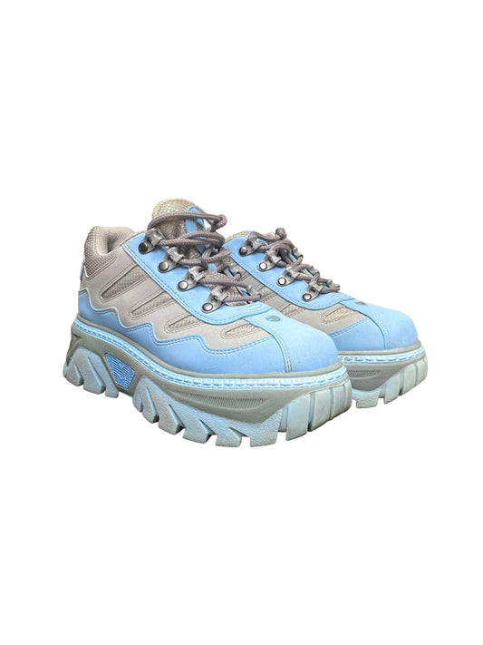 Light blue and gray vintage platform boots with chunky sole and lace-up closure