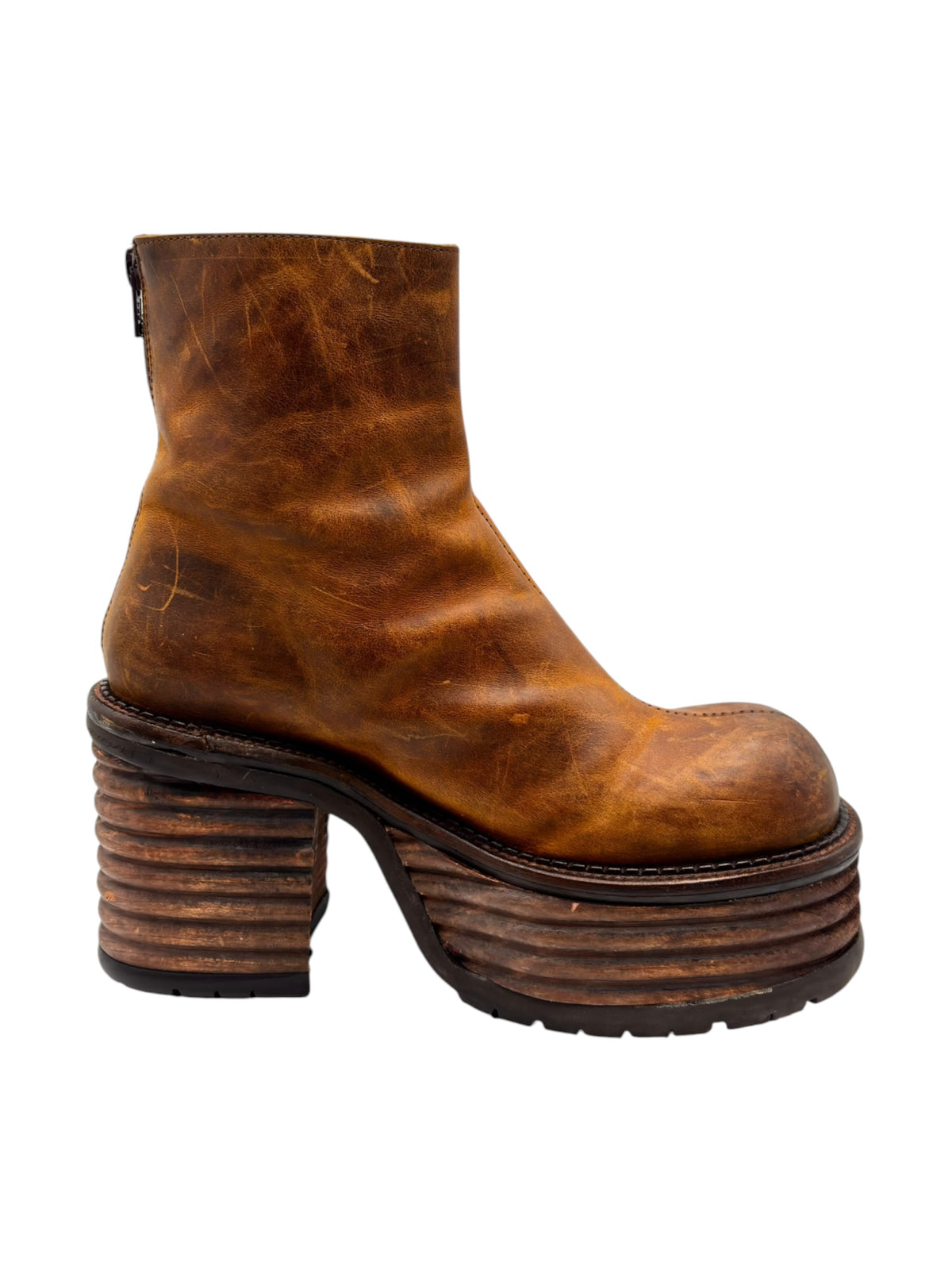 Brown leather platform ankle boots with side zipper and chunky stacked heel