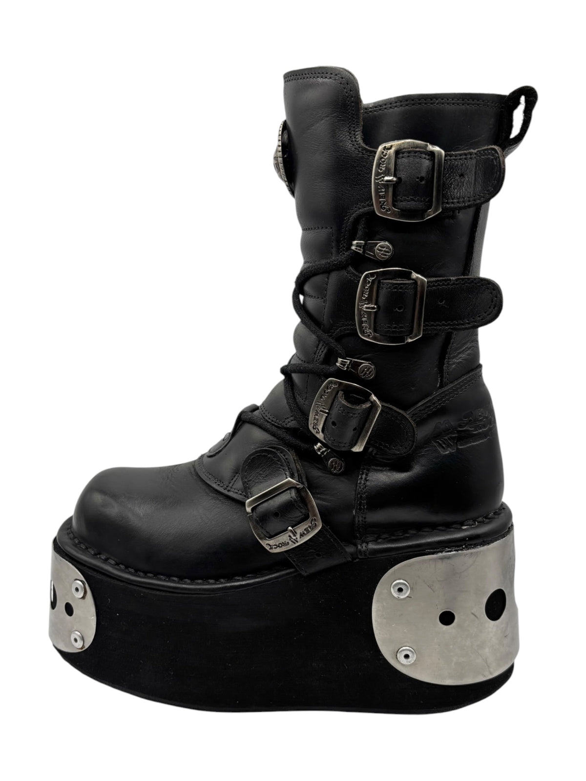 Black leather platform boots with buckled straps and silver studded sole plates