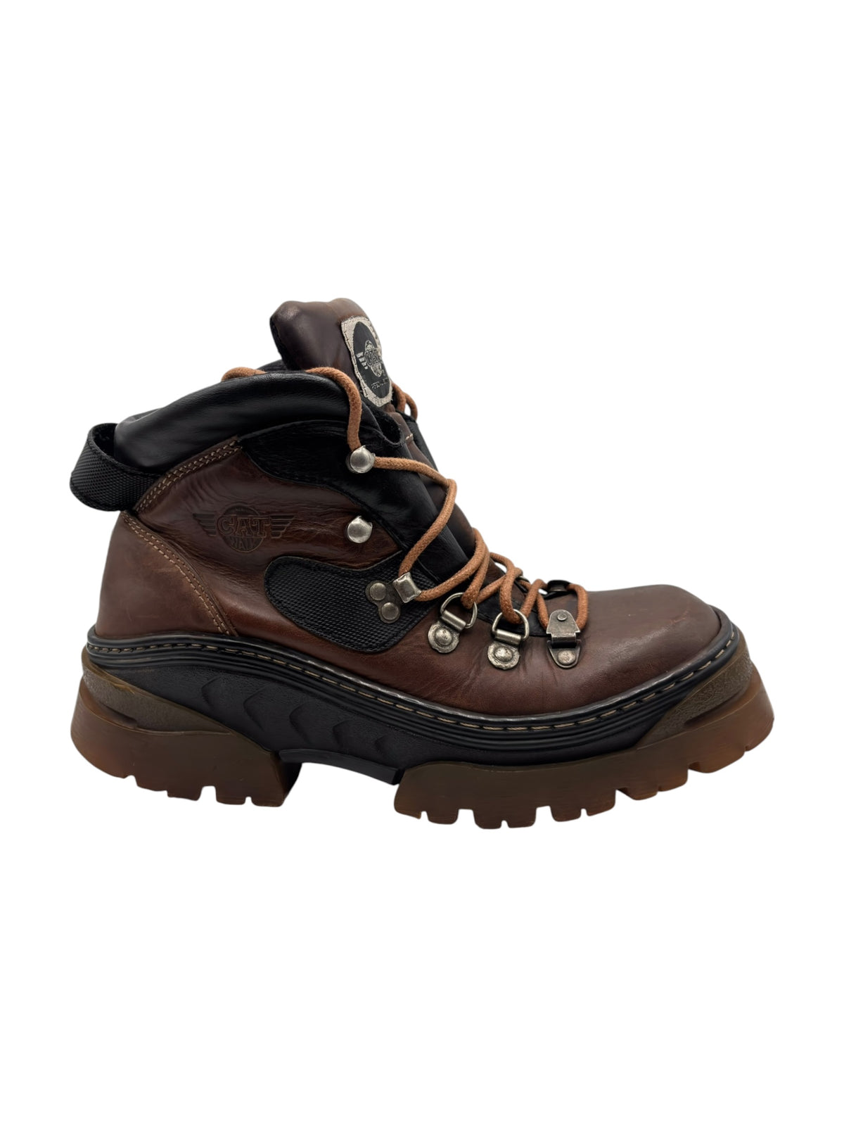 Brown and black lace-up leather boot with rugged lug sole and lace eyelets