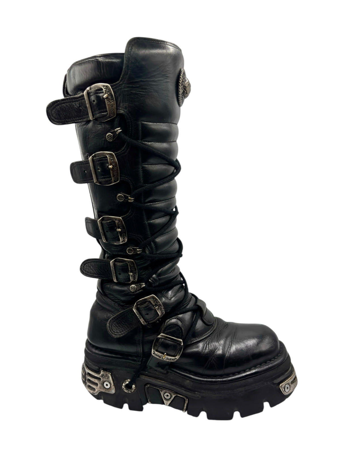 Black knee-high boots with multiple straps and buckles, platform sole and rounded toe