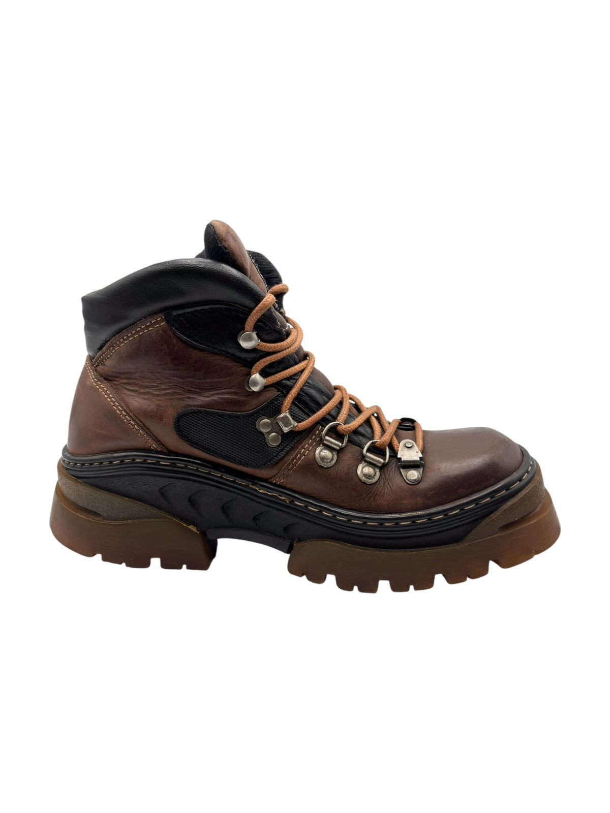 Brown leather lace-up boot with black collar trim, metal eyelets, and chunky tread