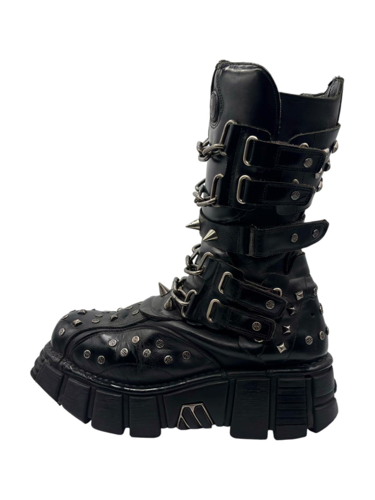 Studded chain platform boots in black, side view with multiple buckles and studs