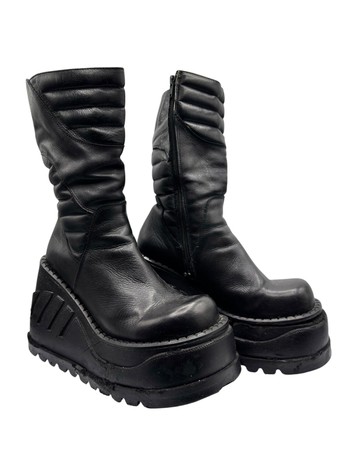 Black mid-calf leather platform boots, angled side view with ribbed outsole