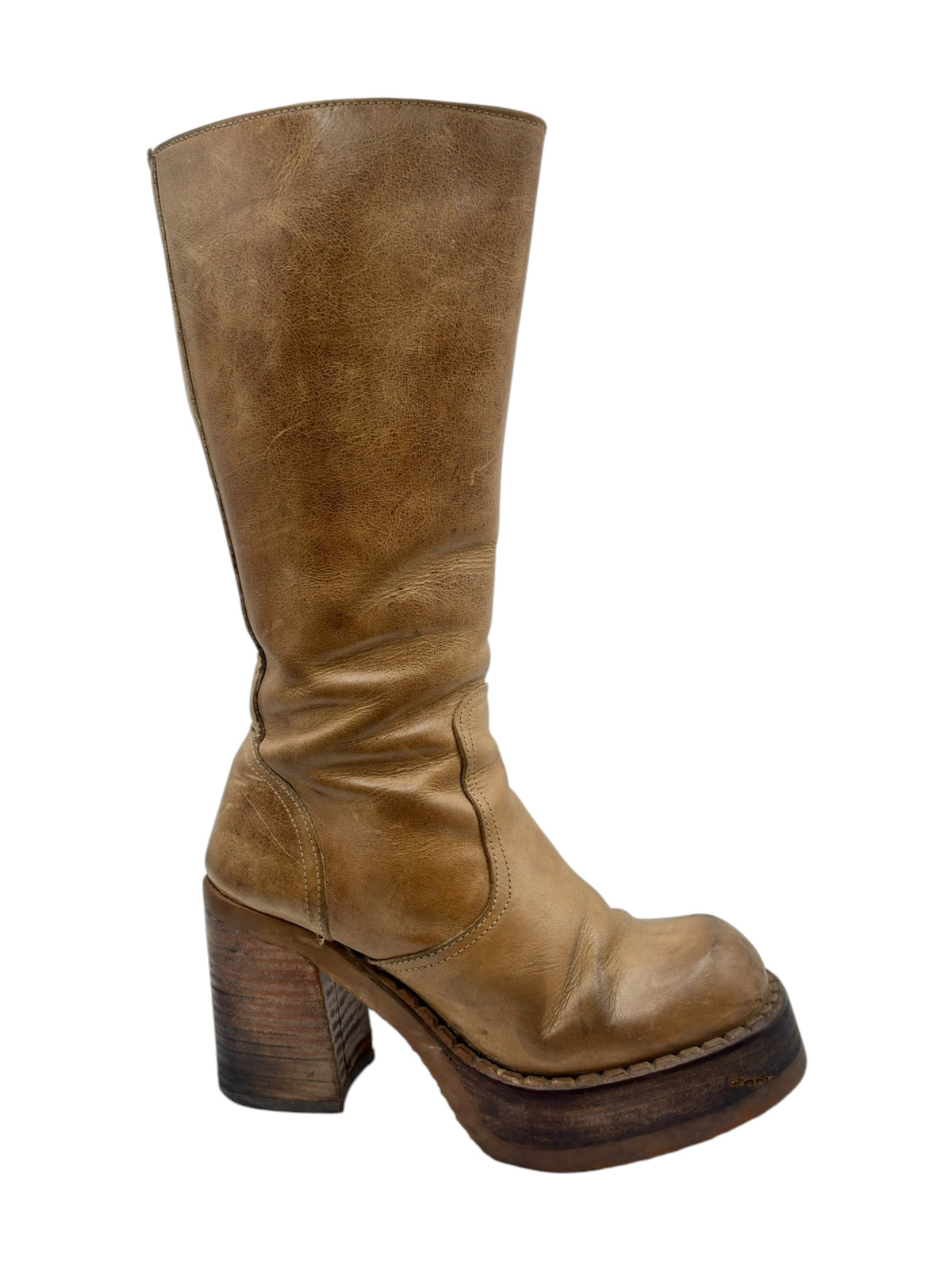 Tan knee-high boots angled view with side seam and thick block heel sole.