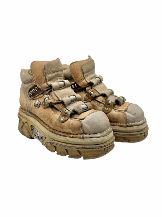 Beige New Rock platform boots, angled side view with laces and chunky outsole