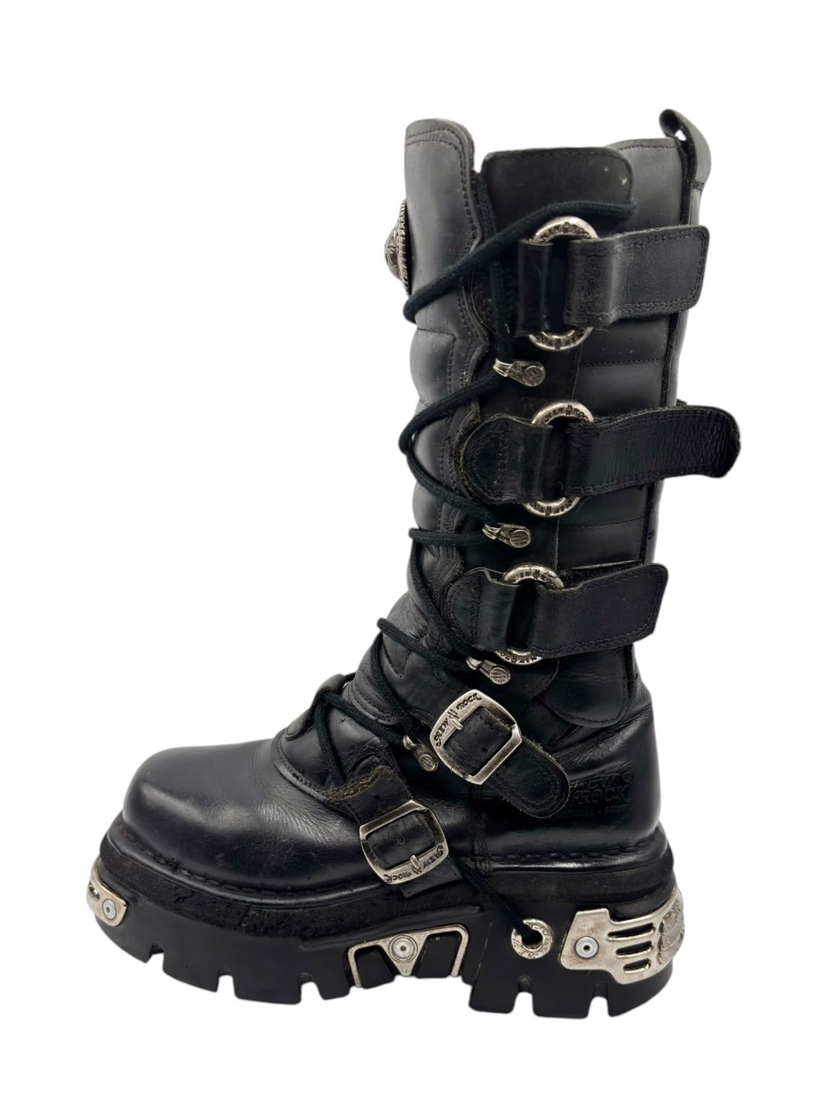 Black knee-high leather boots with three buckle straps and chunky platform sole