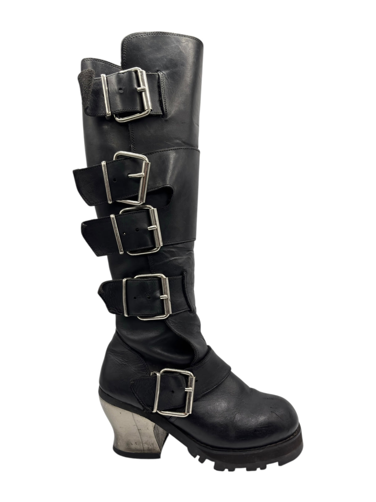 Knee-high boots with multiple rear buckle straps and thick rubber tread sole