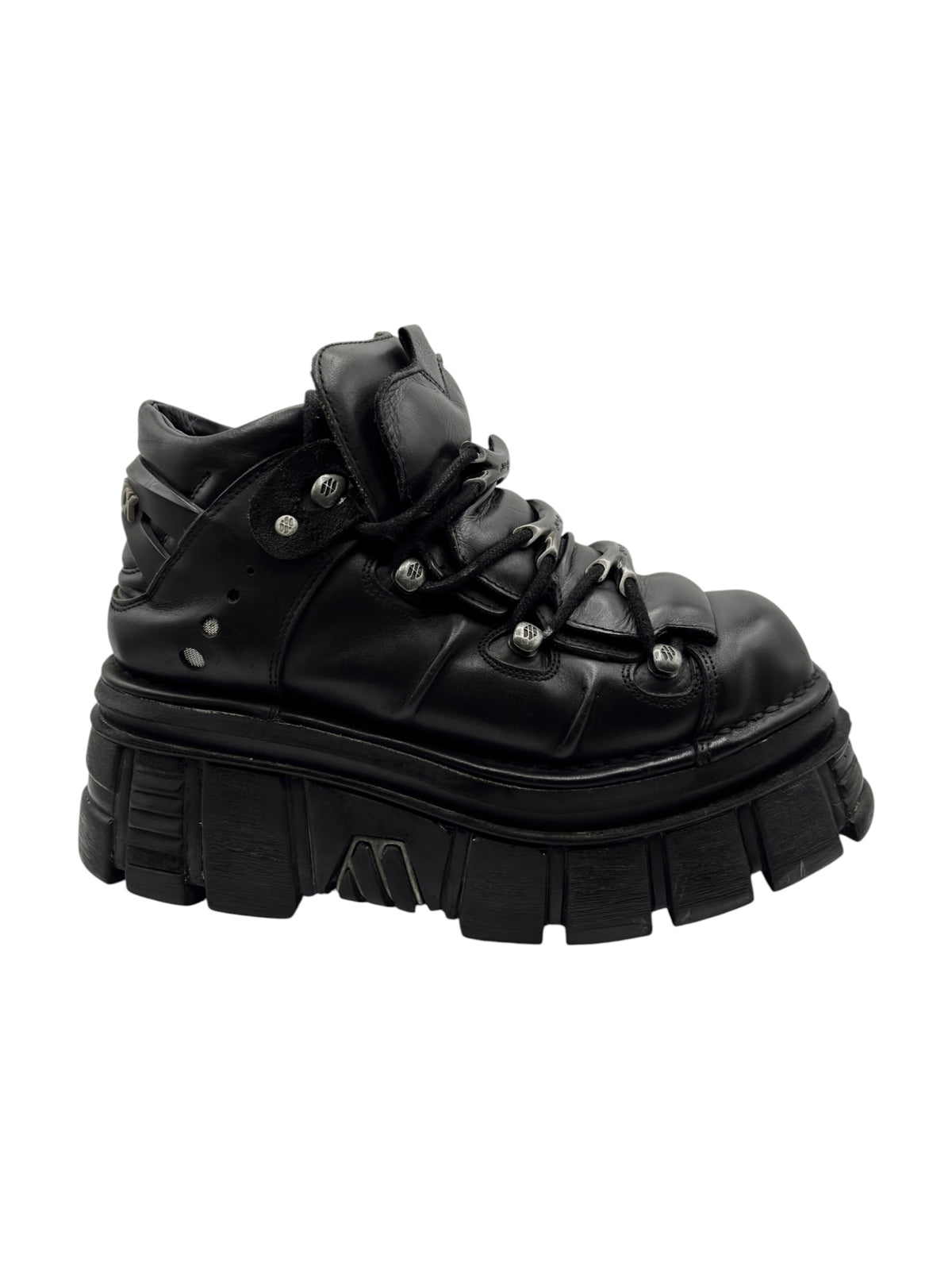 Black lace-up platform boots with padded collar and chunky lug outsole