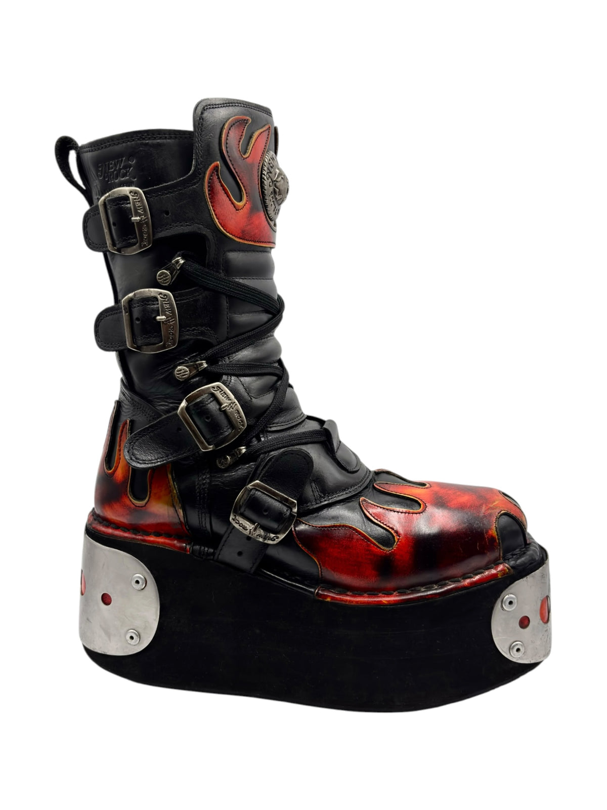 Black flame platform boot with tall straps, buckles, and red-orange flame side panel.