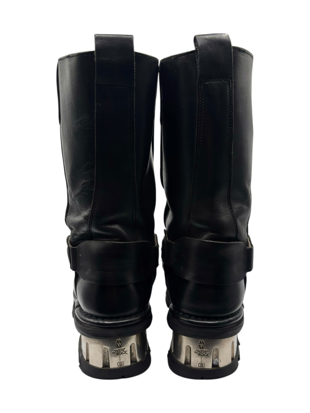 Back view of black mid-calf biker boots with pull tabs and chunky textured sole