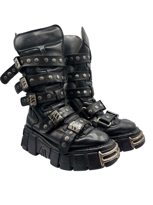 Black New Rock vintage studded strap boots angled side view, layered straps and buckles