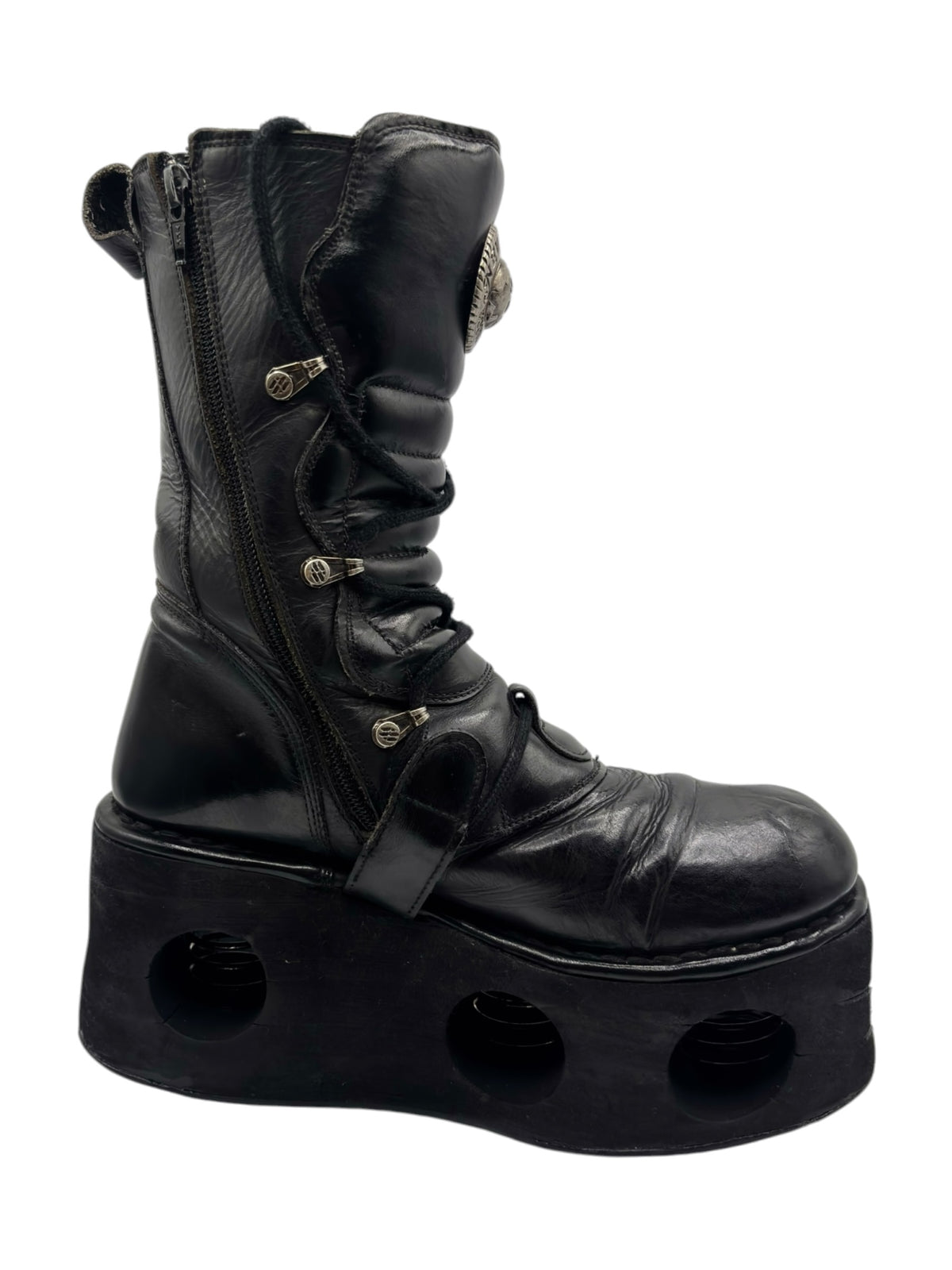 Black mid-calf platform boot side view with buckle straps and lace-up